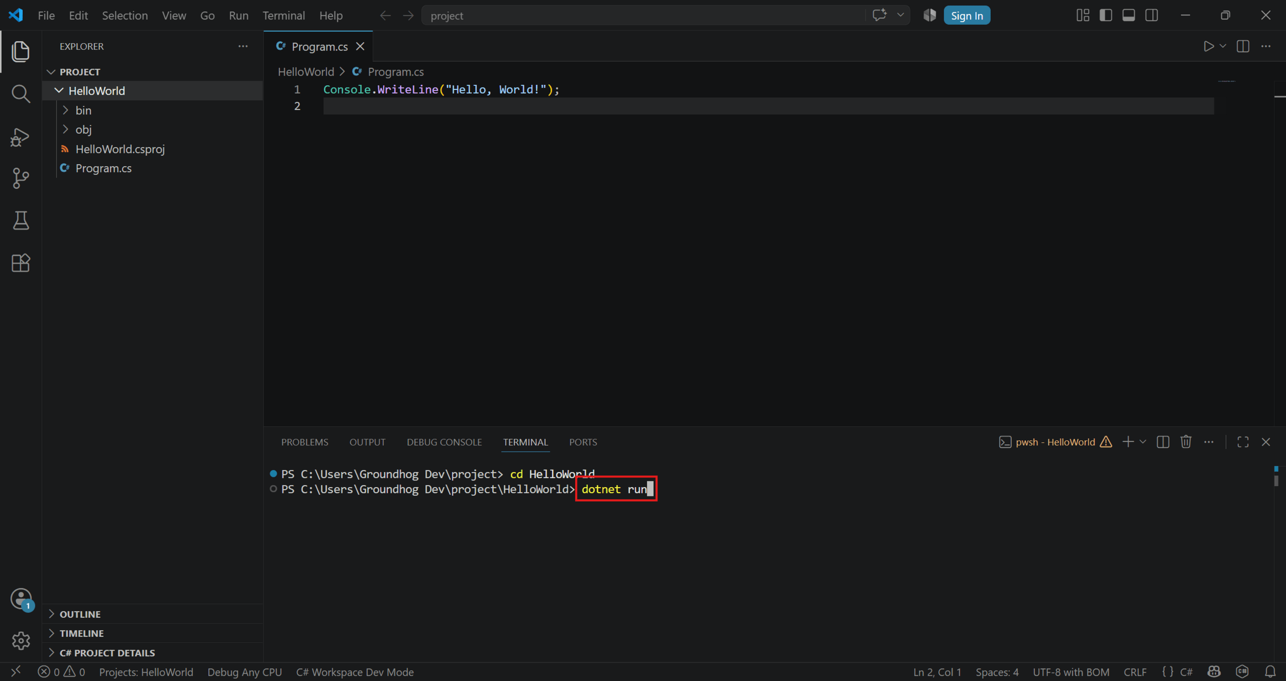 The dotnet run command typed in the terminal